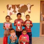 Pupils outside the new Shree Nawa Durga rebuilt Lower Secondary School in Gorkha, Nepal