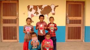 Pupils outside the new Shree Nawa Durga rebuilt Lower Secondary School in Gorkha, Nepal