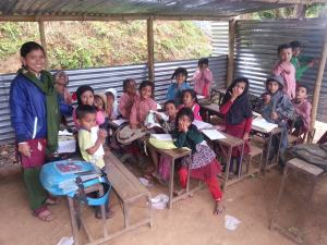 Pupils in tin hut classrooms